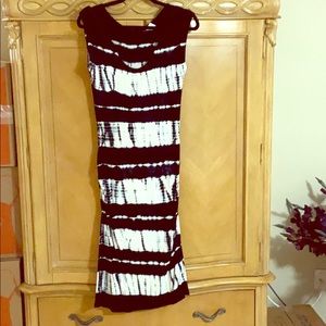 Mid length stretchy, round neck dress.